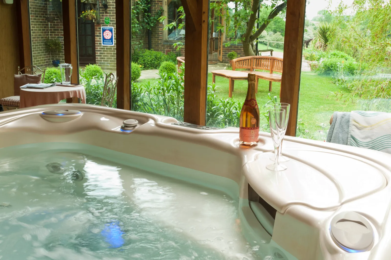 Hot tub with garden views | Alkham Court Farmhouse Bed and Breakfast